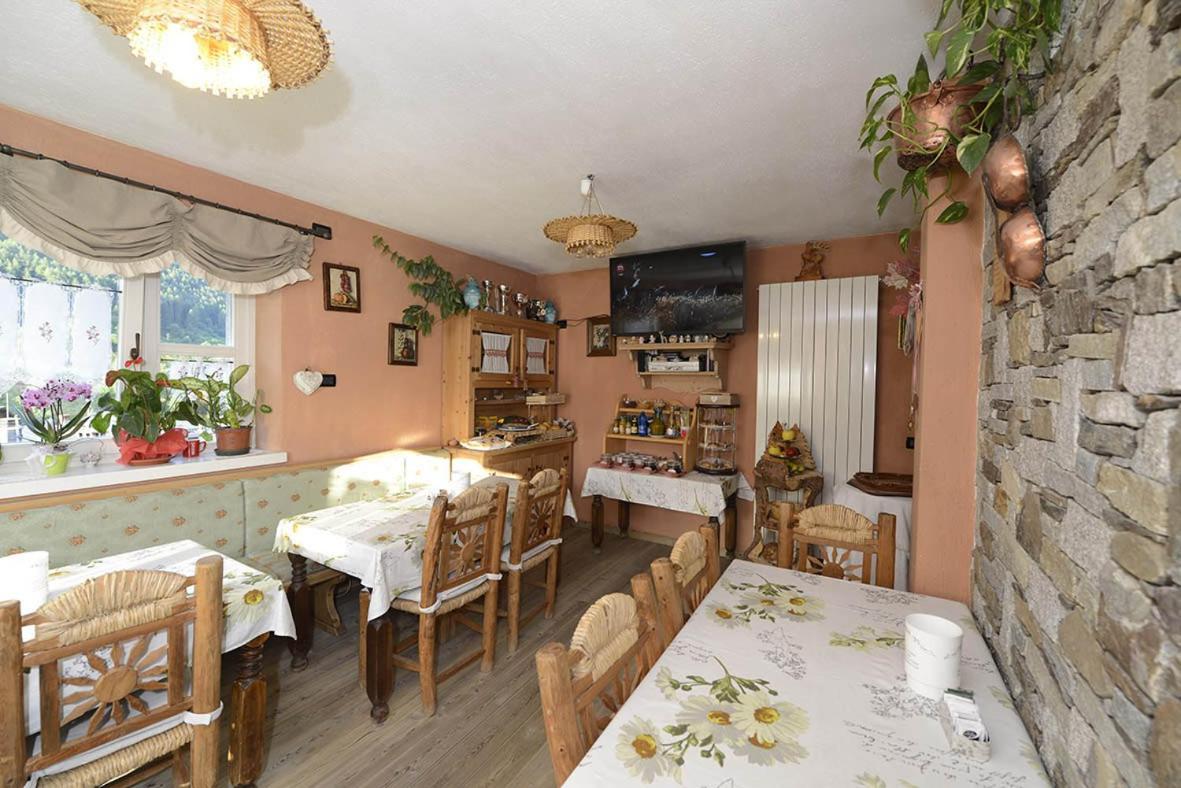 Couette-café Garni La Genziana 3*